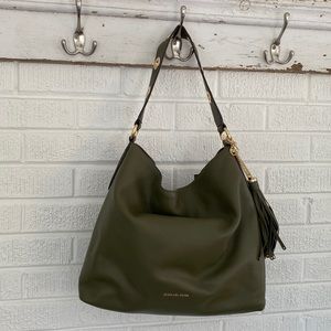 Michael Kors olive green handbag with studded tassel